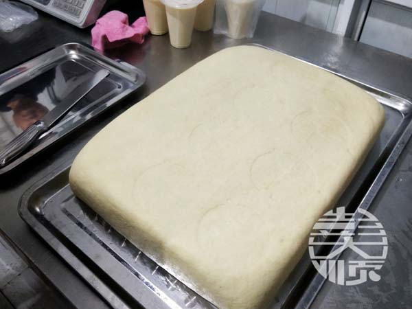 郭老板對(duì)自己做的豆腐很是滿意